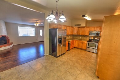 Fireplace and Kitchen pic for 7540 N Jen