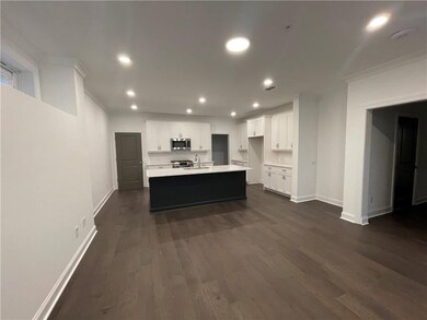 You will love this open concept with the kitchen overlooking the Dining and family room. Not actual home