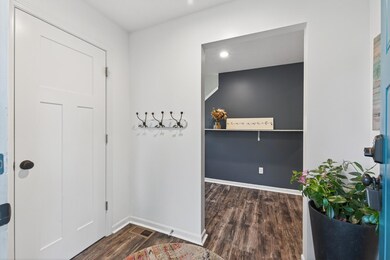 Functional entry with storage for coats and shoes.