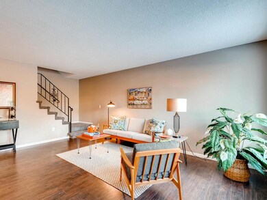 New flooring and fresh paint highlight the living 