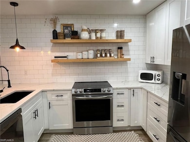 50 Emerald Woods Dr unit 9, Naples, FL 34108 - photo 2