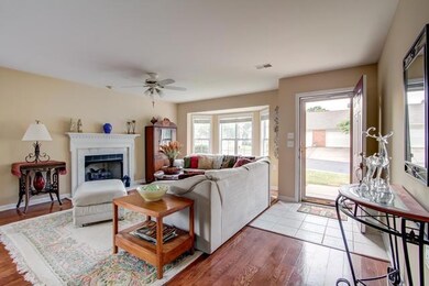 You’ll love this spacious family room, with the bay windows, gas fireplace and hardwood floors.   The openness of the area is perfect for entertaining with your newfound friends.