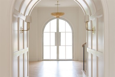 Empty room featuring french doors and crown moldin