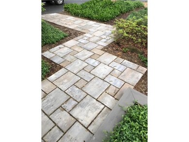 lovely stone walkway leading to front door