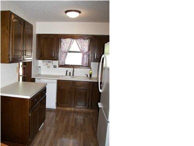 The kitchen has lots of storage and counter space.
