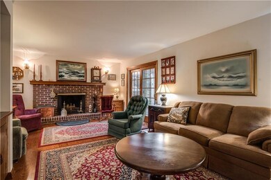 THIS FAMILY ROOM FEATURES BEAUTIFUL NEWER HARDWOOD