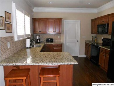 Kitchen opens to great room which means lots of li