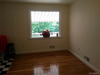 Dining room with Picture window view over deck to lawn and woods!
