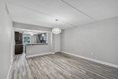 View into the Kitchen with Island Bar~