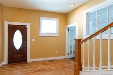 Welcome inside! This entry hall is so warm and inv
