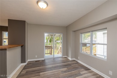 Dining room leading to back yard.  Plenty of light and enjoyment