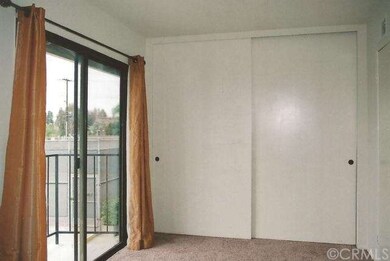 Spacious 2nd bedroom with balcony.