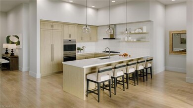 Kitchen with light hardwood / wood-style flooring,