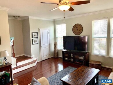 With conveniently located powder room in corner!