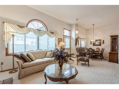FORMAL LIVING ROOM AND DINING ROOM WITH CUSTOM WIN