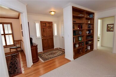 Beautiful Entry with built-in book shelves in the 