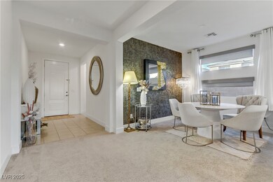 Carpeted dining area with tile patterned flooring,