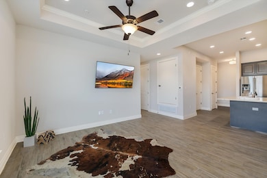 Unfurnished room featuring visible vents, baseboa