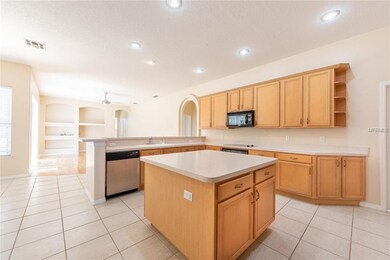 SPACIOUS KITCHEN showcases a CENTER ISLAND for add