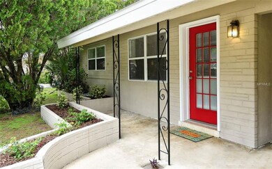 Front Porch covered with brick planter adds to cur