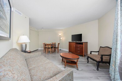 Living room featuring light hardwood / wood-style 