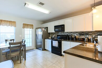 Tile floors, tile backsplash and lots of cabinet space!