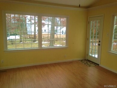 Beautiful Sunroom with wall to wall windows, leads