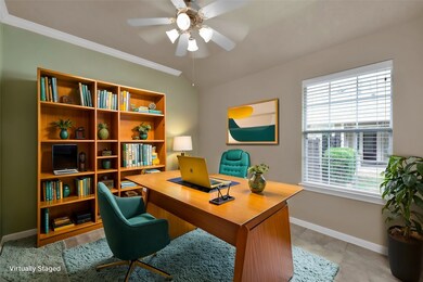 Flex room virtually staged as an office.