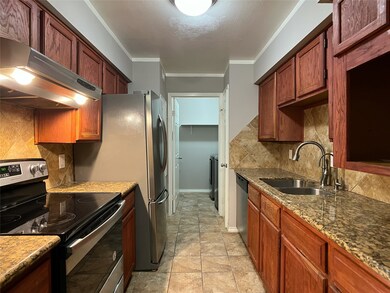 stainless appliances: smooth-top range, vent hood,