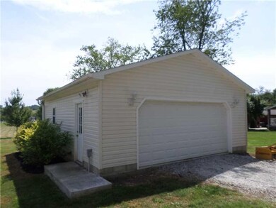 Parking Lot/Garage. There is also a detached 2 car