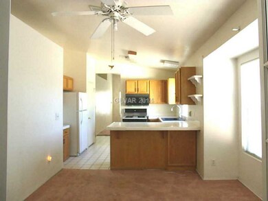 Property Photo. View from dining into kitchen