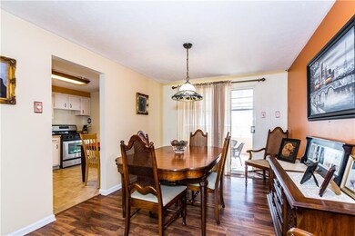 Nice size dining room with patio doors that lead t