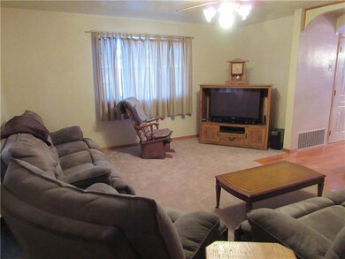 New carpet and a ceiling fan with light.