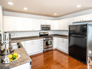 Spacious kitchen with stainless steel appliances a