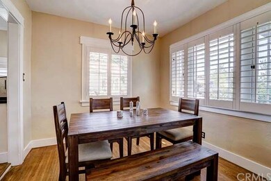 Formal dining room with chandelier and plantation 