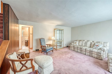 Enter into the sunlit living room.