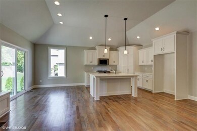 Kitchen and dining. Walk in pantry, gas range, and