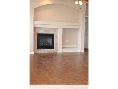 Living Room. Spacious living area has hardwood flo