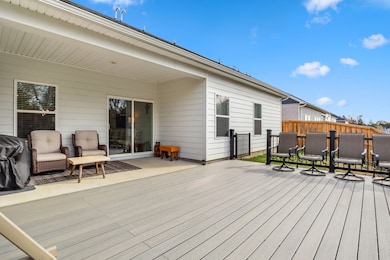 Enjoy your outdoor space under the roof or under the stars!  This flexible space connects to the living room with sliding doors for indoor/outdoor living.