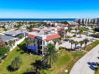Bird's eye view of a large body of water and apartment complex