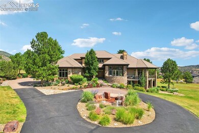This estate impresses with a circular drive, professional landscaping, tranquil water features, and timeless curb appeal. Including oversized 3-car garage with epoxy floors and built-in cabinetry.