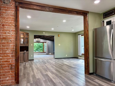 Kitchen view into Dinning & Living Room - 317 3rd St W, Hastings