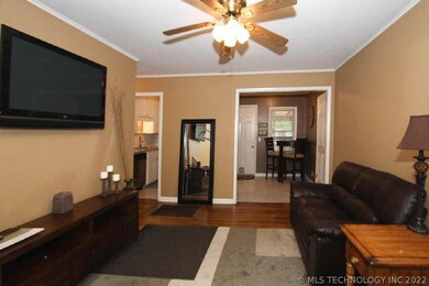 Spacious living open to dining.