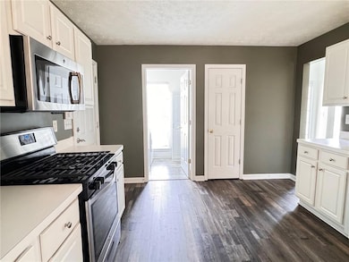 Kitchen with appliances with stainless steel finis