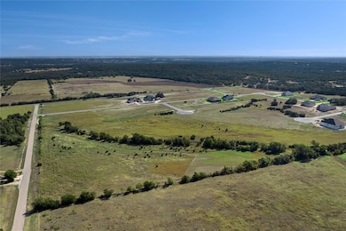 Aerial view of property's location with rural landscape