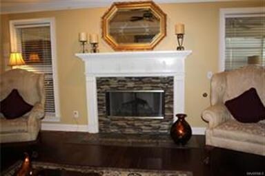 Pretty tile surround and mantle with this gas log 