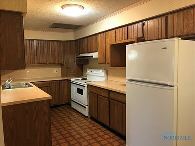 Galley kitchen, dishwasher, range/oven, fridge