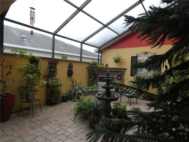 Gas fireplace graces the right side of courtyard.