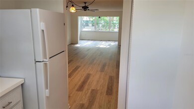 View from kitchen to dining area, living room and Florida room