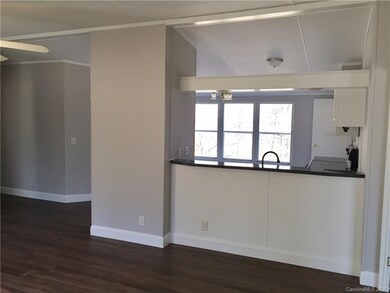 Den looking into the kitchen